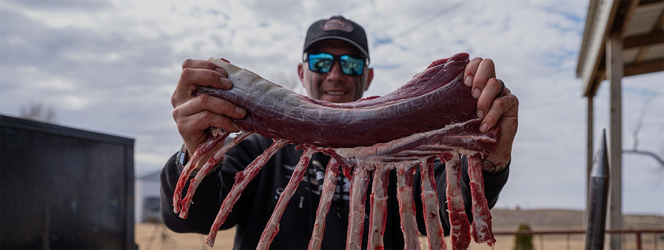 John Dudley holds up a backstrap