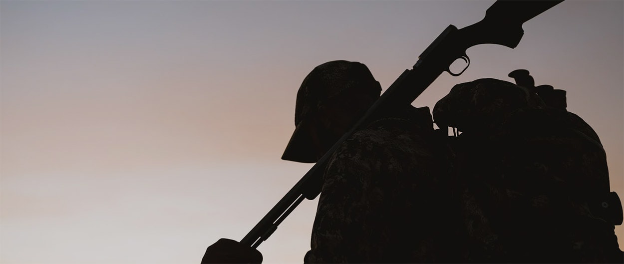 Craig Francis with a muzzleloader on his shoulder