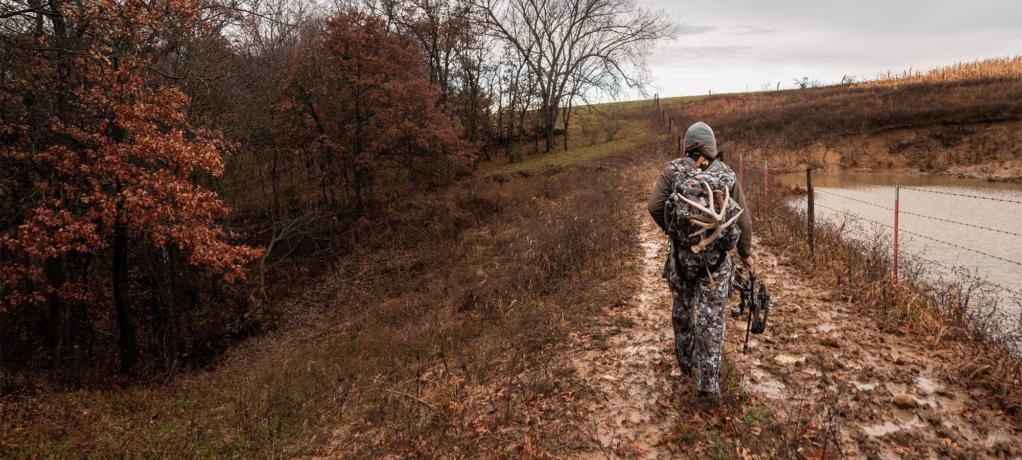 Chris Bee walking to the tree stand late fall | SITKA Gear
