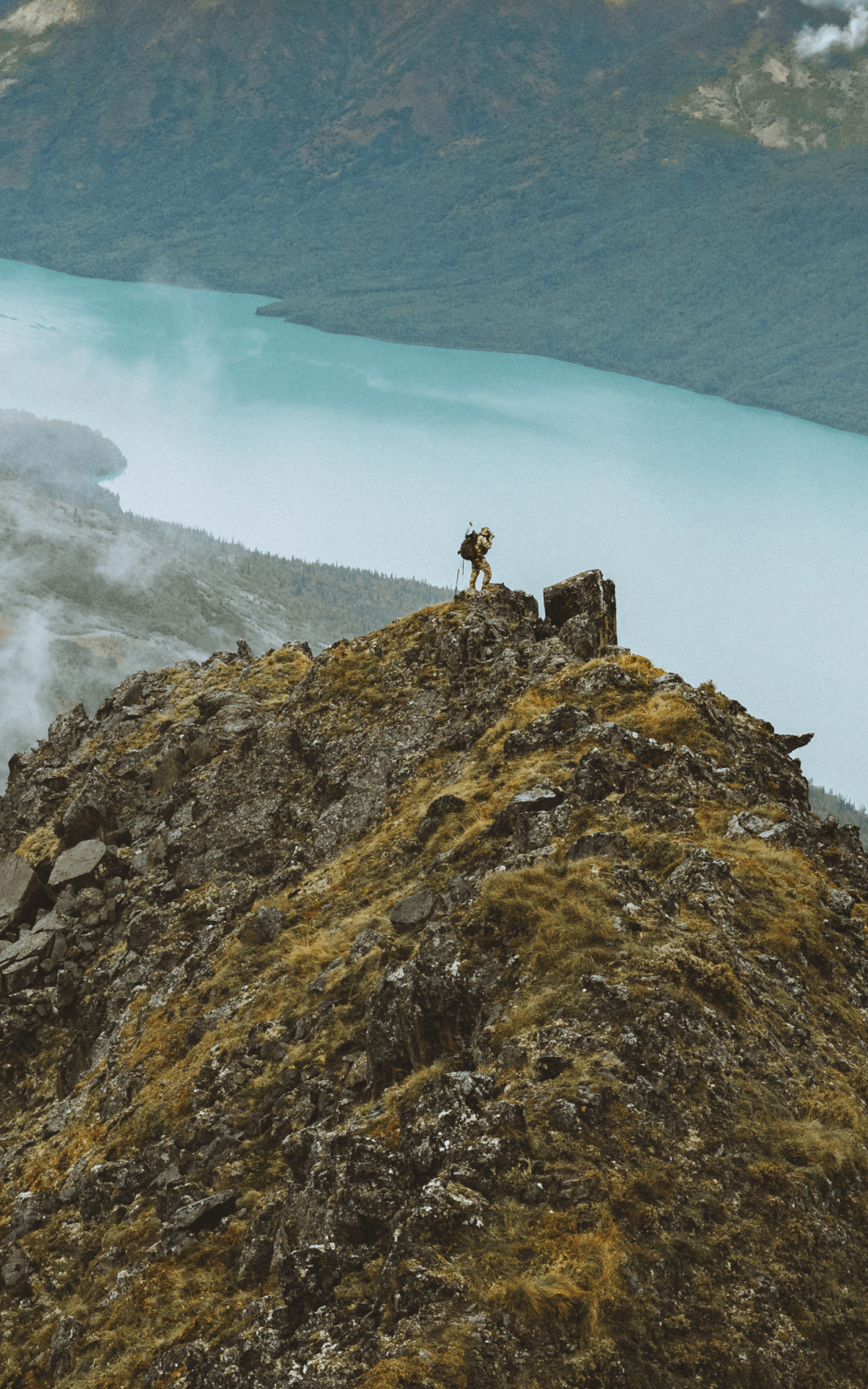 Paul Forward on the top of a mountain glassing | SITKA Gear