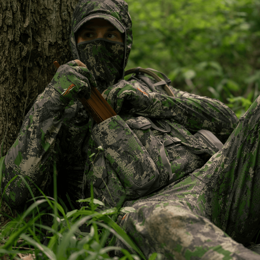 Man using the Turkey Tool Belt in Optifade Cover while turkey hunting