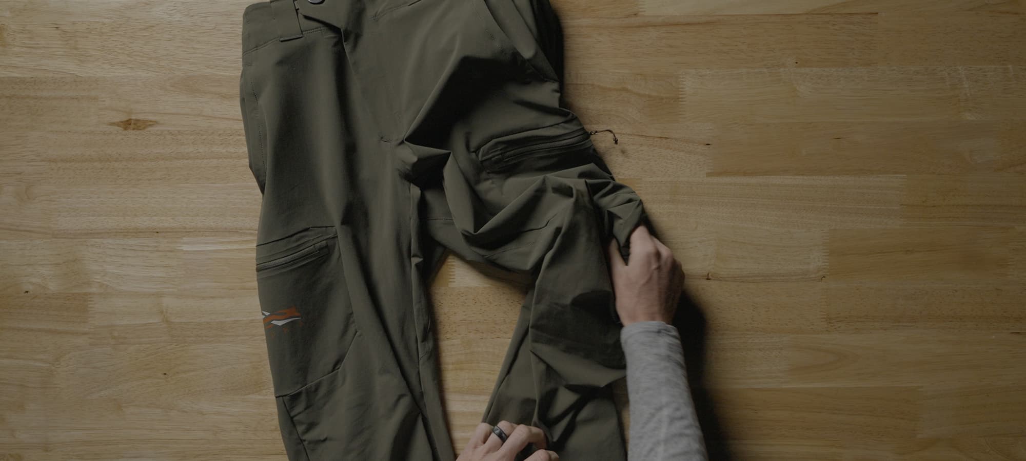 Laydown shot of the Ascent Pant in Pyrite | SITKA Gear
