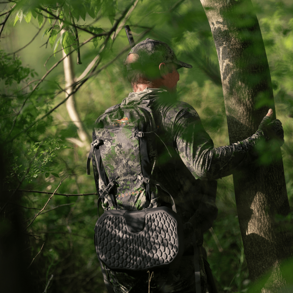 Main wearing Turkey Vest in Optifade Cover while turkey hunting