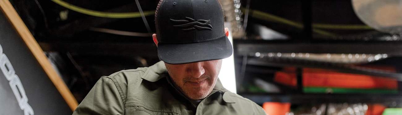 John Dudley getting his compound bow ready to roll