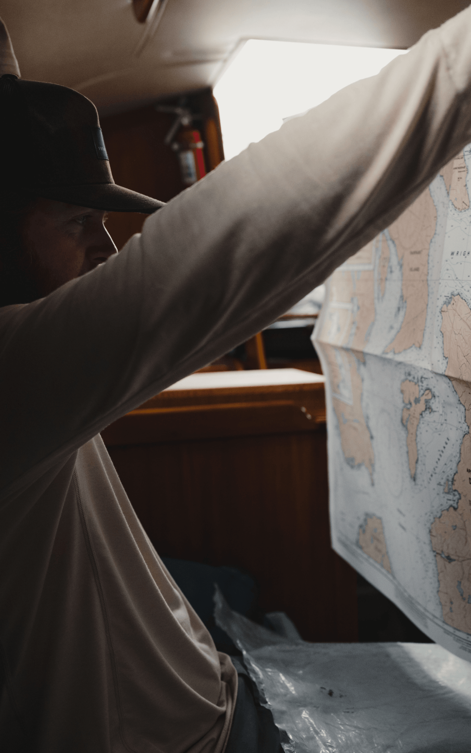 Connor Gabbott looking at a map - Ebb and Flow | SITKA Gear