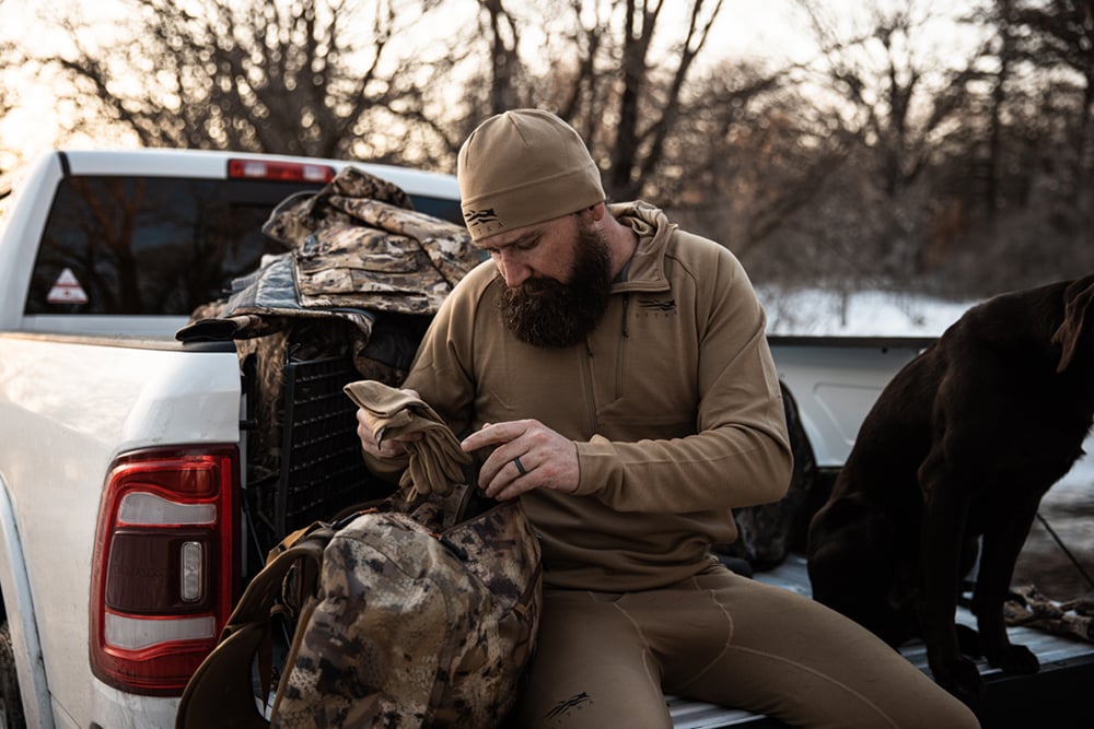 Man packing Waterfowl bag | SITKA Gear