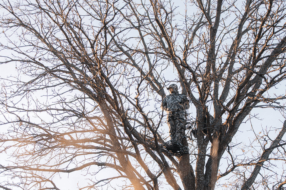 Man in Optifade Elevated II in his treestand | SITKA Gear