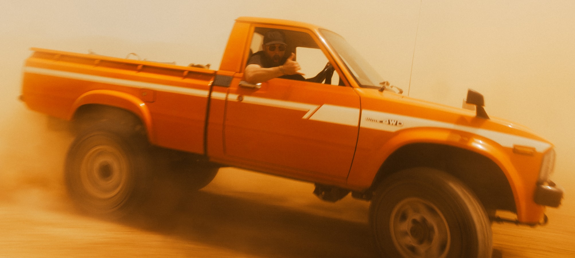 Brad Christian in his pickup truck ripping through the desert | SITKA Studio