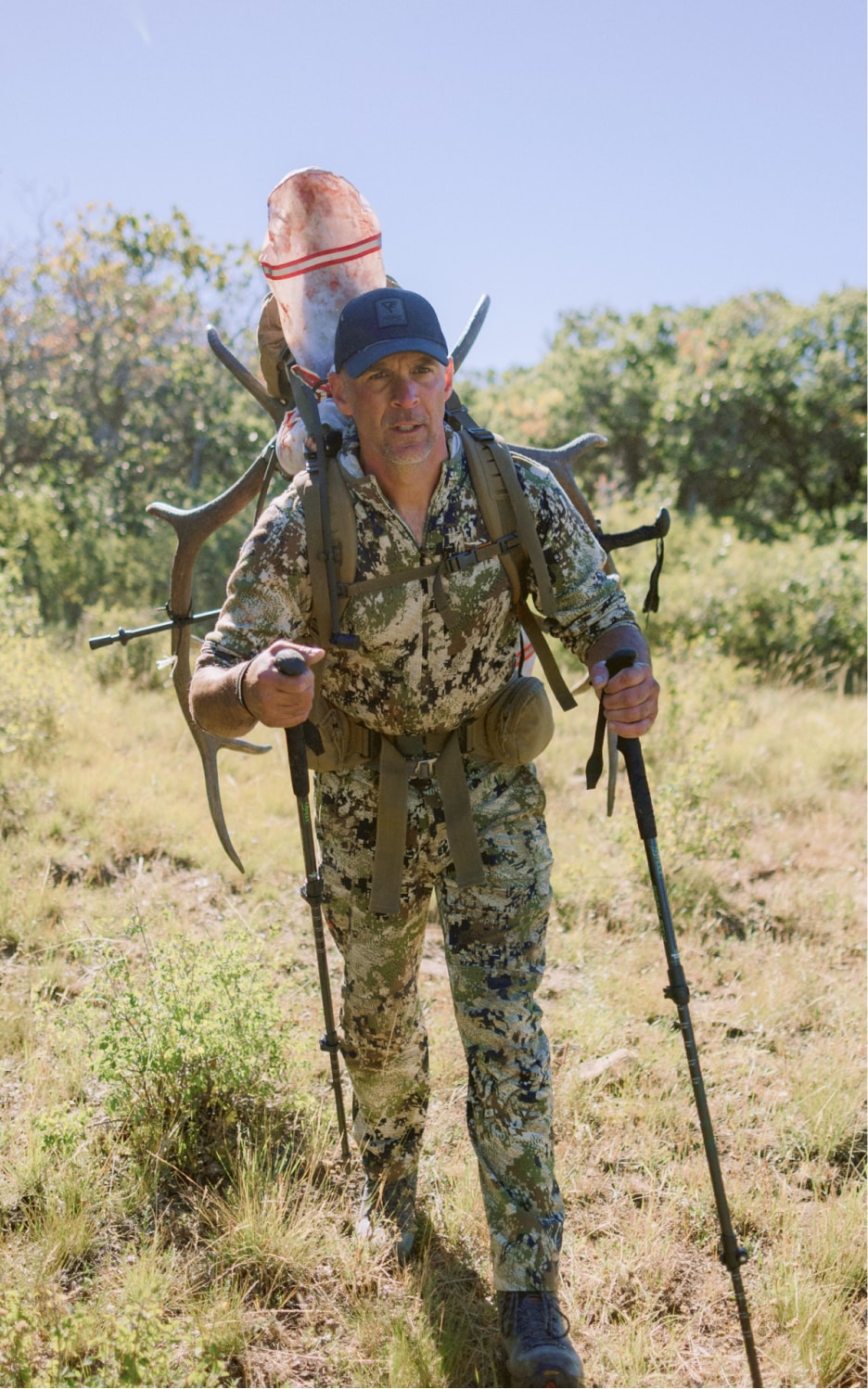 Corey Jacobsen packing out his bull elk in Optifade Subalpine | SITKA Gear