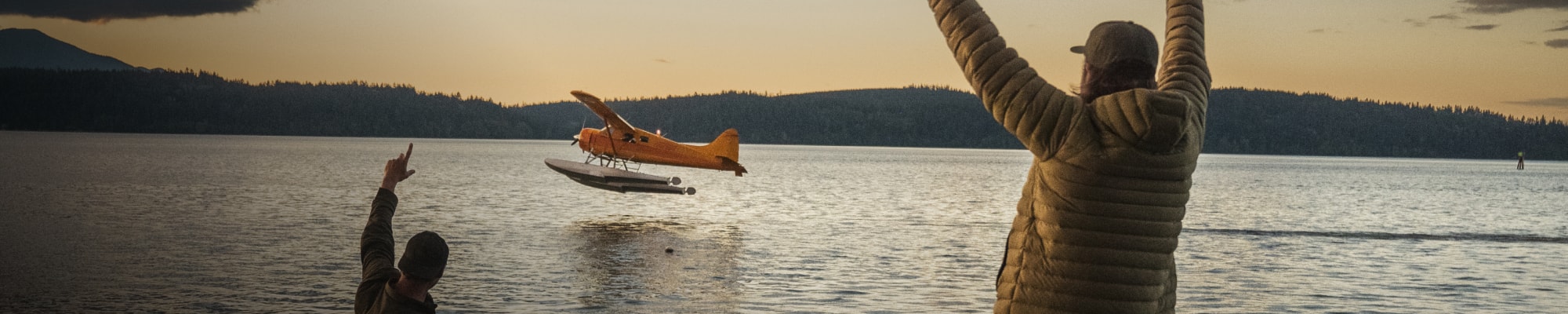 Connor Gabbot waving goodbye to a bush plane | SITKA Gear
