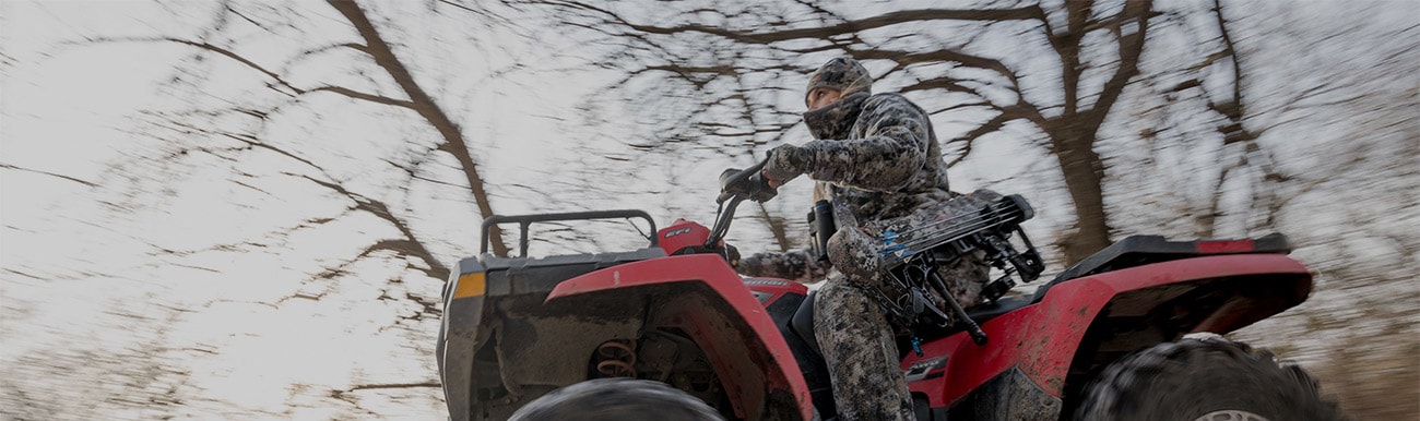 Alex Templeton heads out to her tree stand on a four wheeler