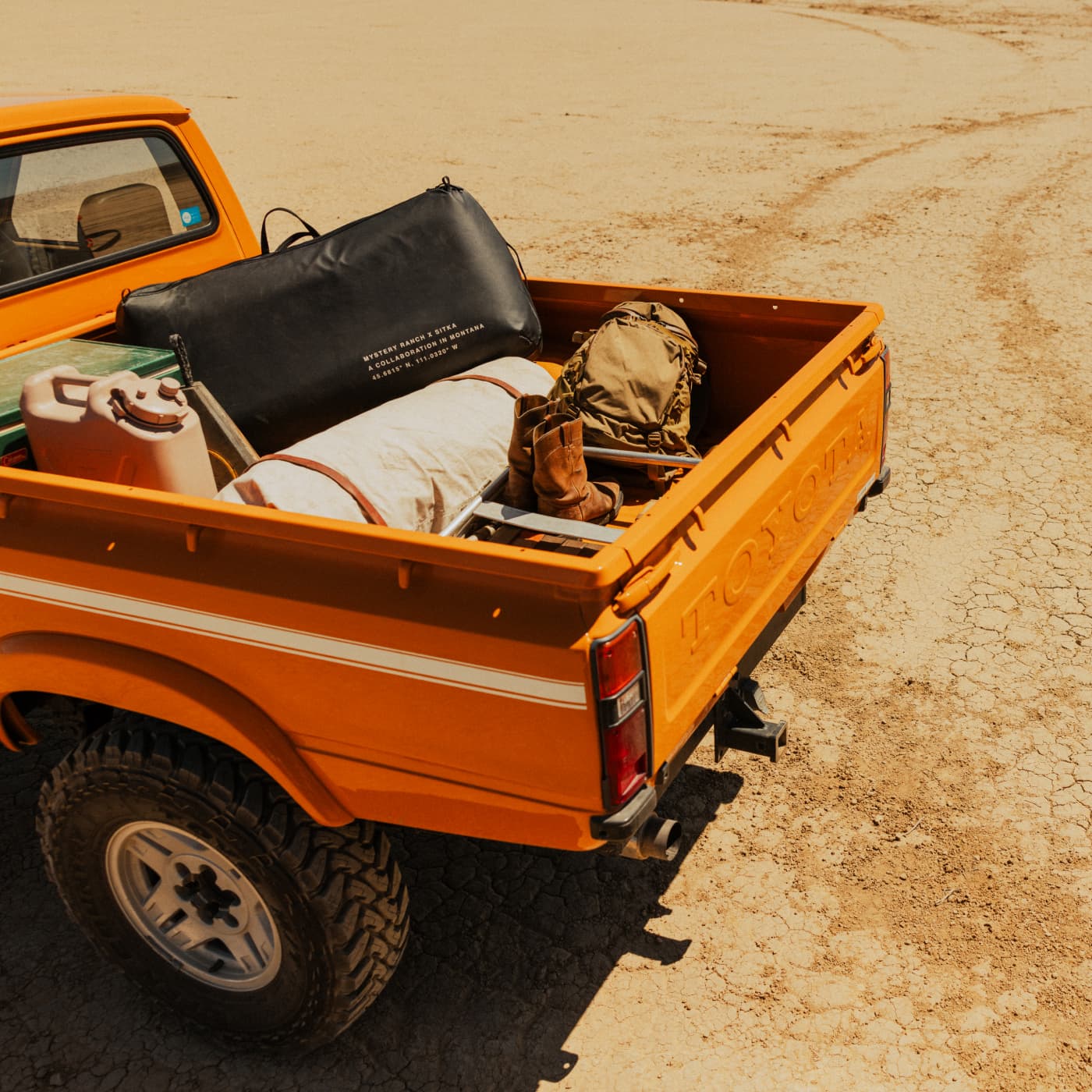 The Mystery Ranch x SITKA Ryder Bow Case in the back of a pickup truck | SITKA Gear