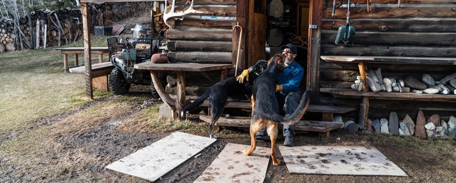Craig Krzycki hanging outside his home with his dogs