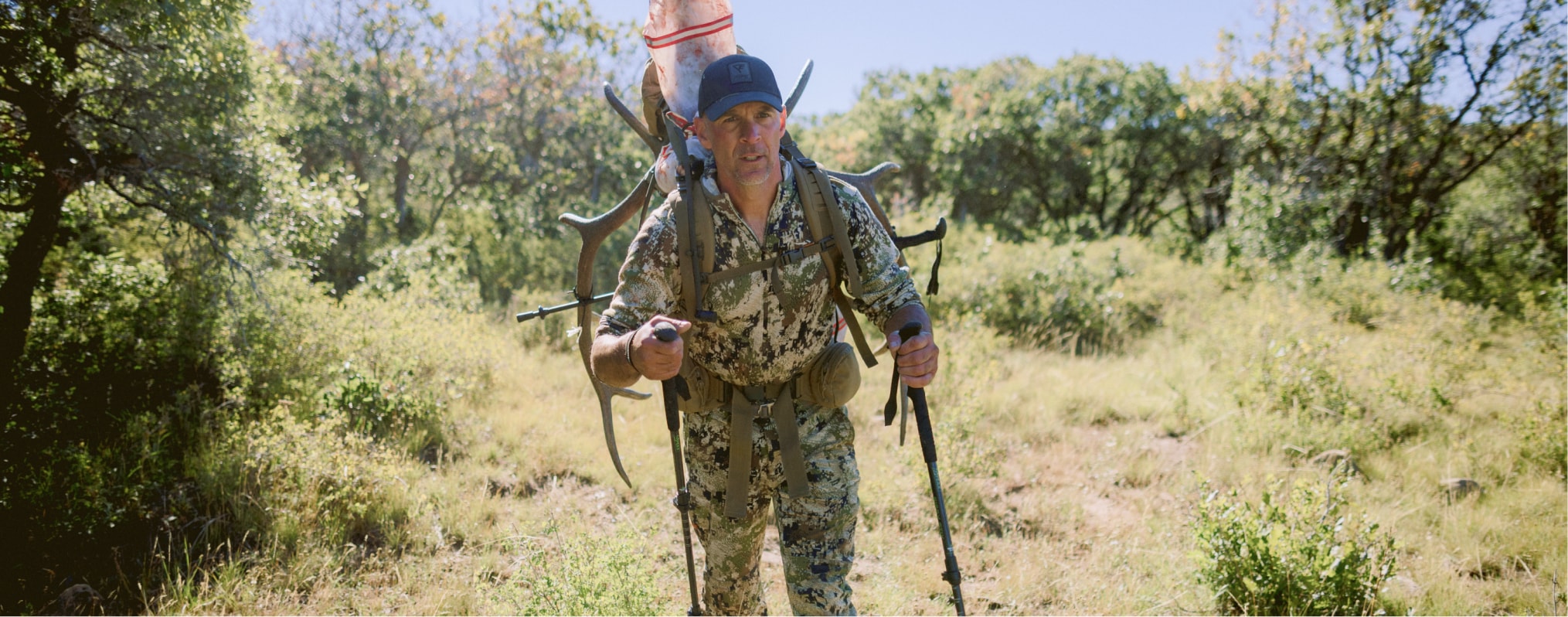 Corey Jacobsen packing out his bull elk in Optifade Subalpine | SITKA Gear