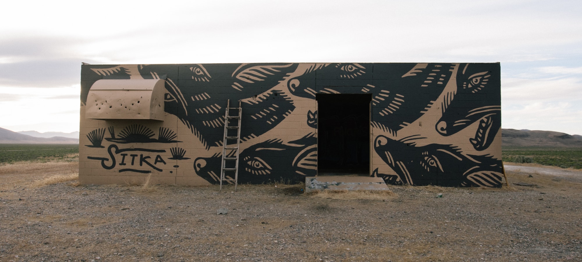 Man sitting in doorway
