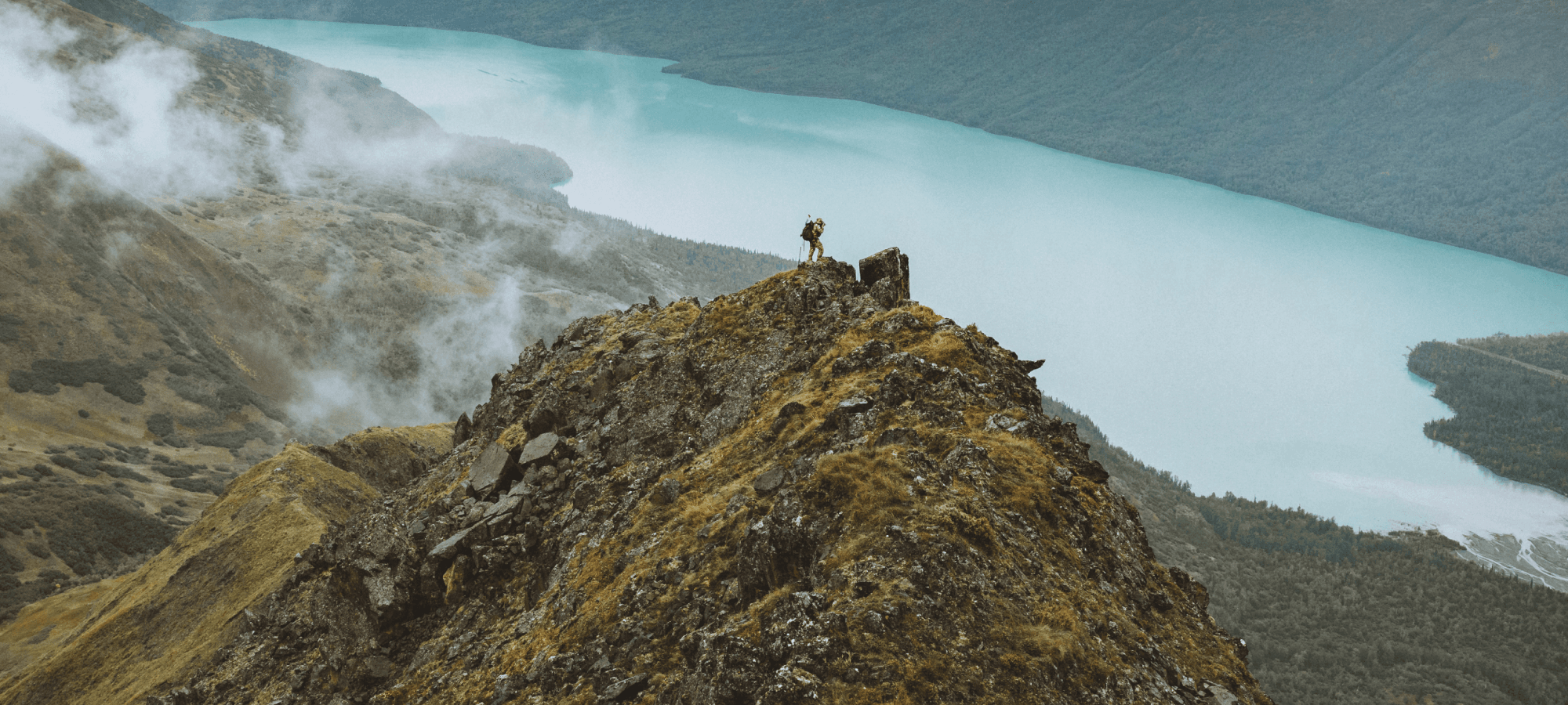Paul Forward on the top of a mountain glassing | SITKA Gear